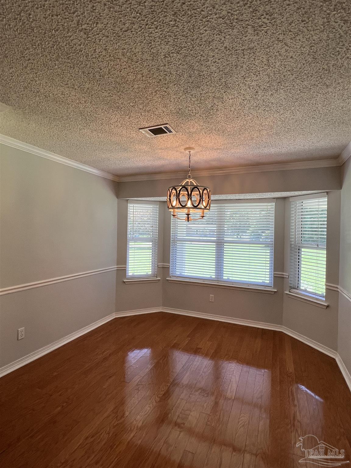 3143 Aarons Way Pace, FL 32571 - Photo 18 of 38 an empty room with a window