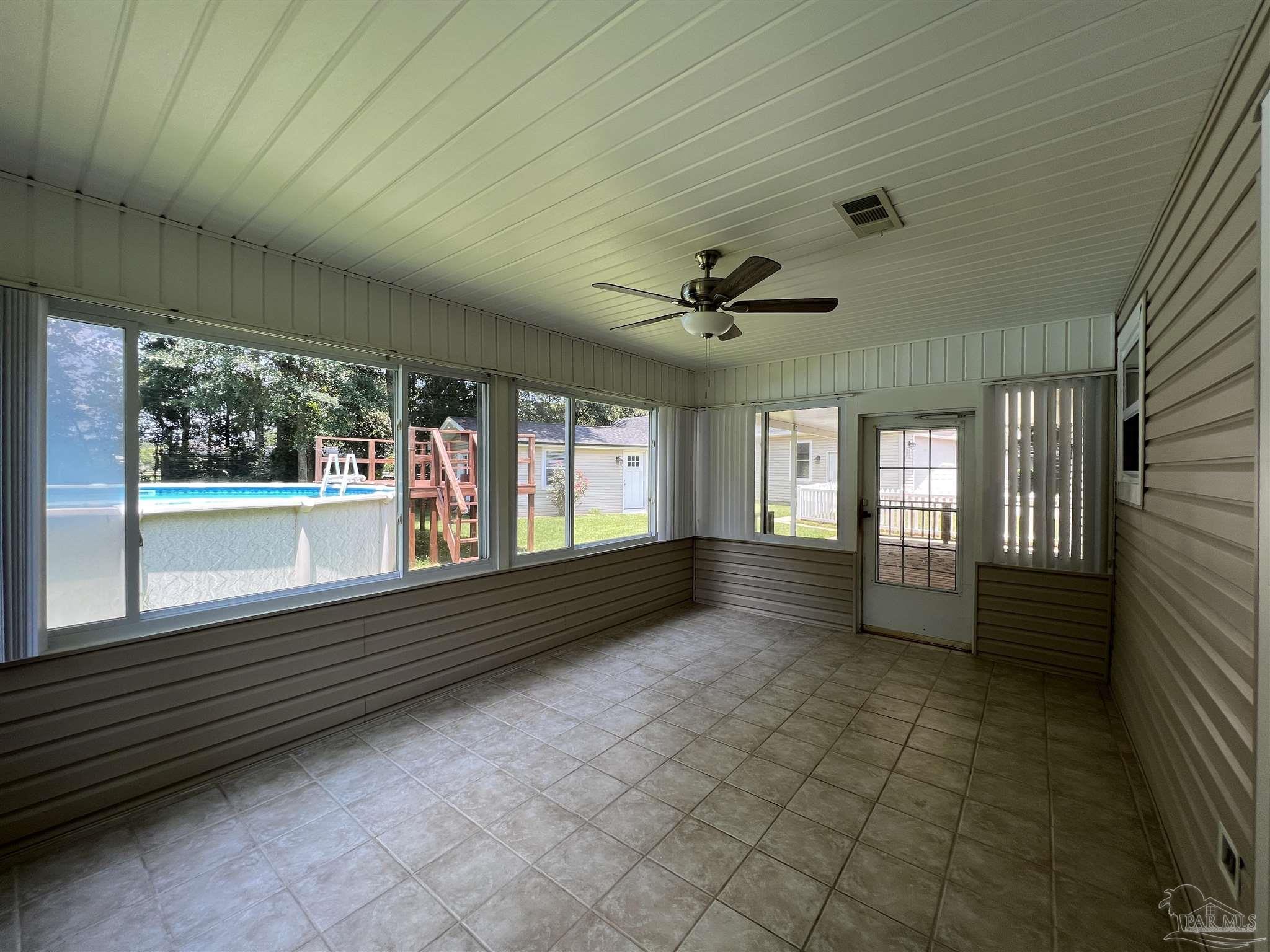 3143 Aarons Way Pace, FL 32571 - Photo 32 of 38 a view of an empty room and window