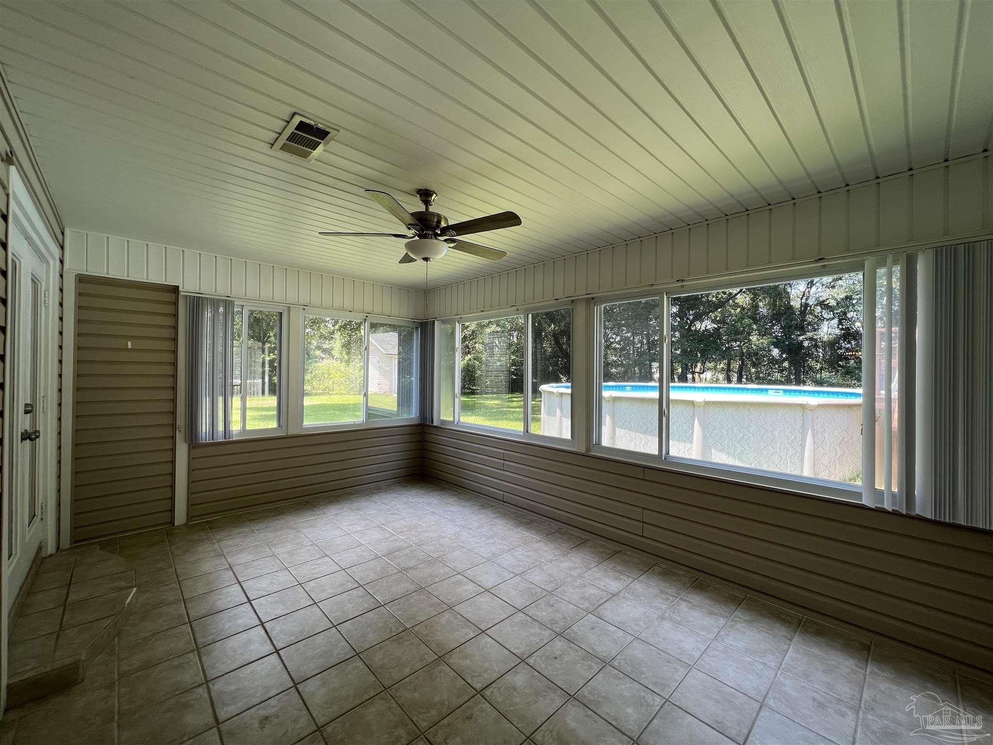 3143 Aarons Way Pace, FL 32571 - Photo 33 of 38 a view of an empty room with a window