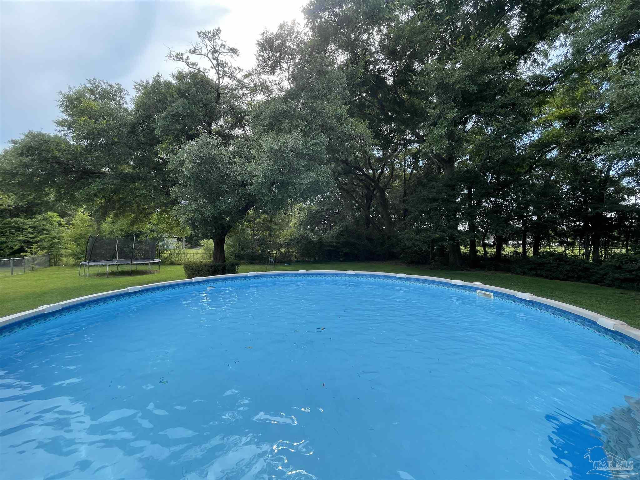 3143 Aarons Way Pace, FL 32571 - Photo 36 of 38 a view of a green yard