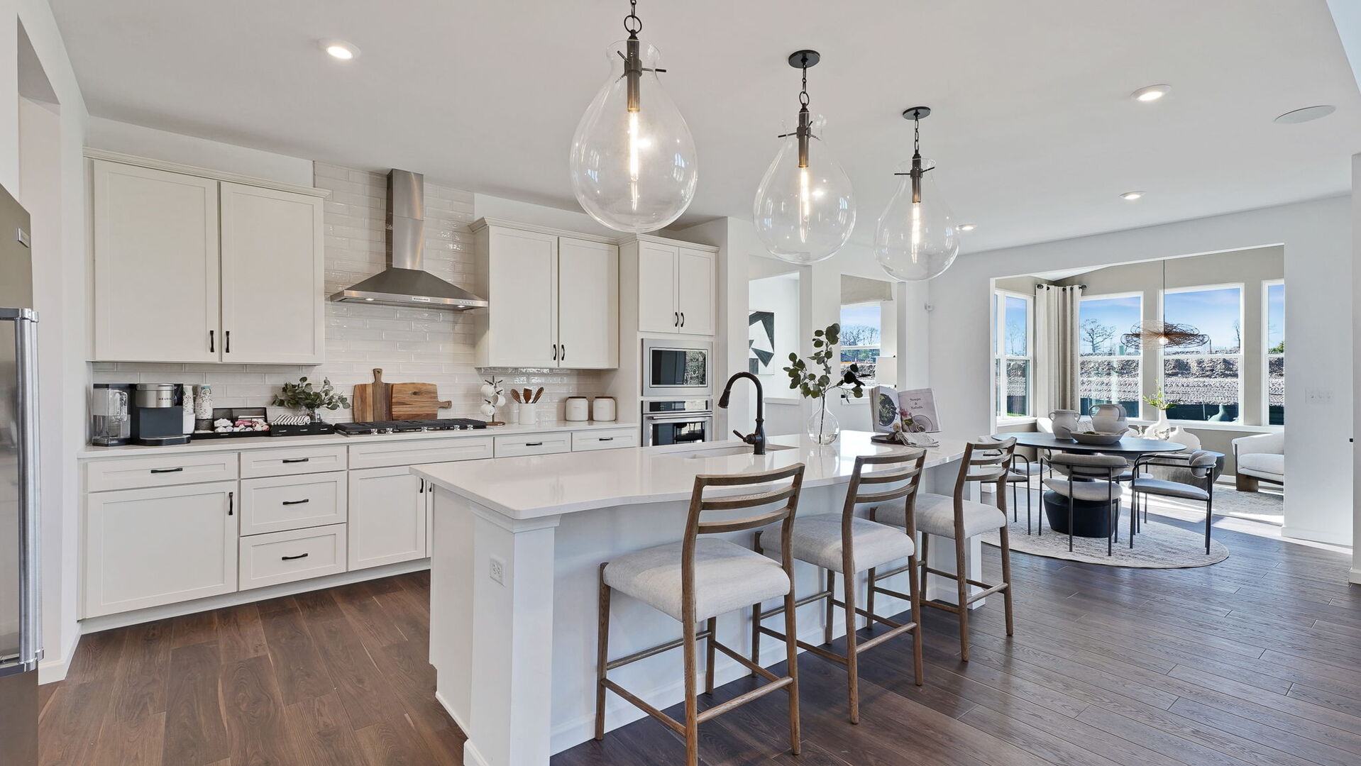 6210 Rivers Edge Drive Lisle, IL 60532 - Photo 2 of 22 a large kitchen with cabinets a sink a stove and wooden floors