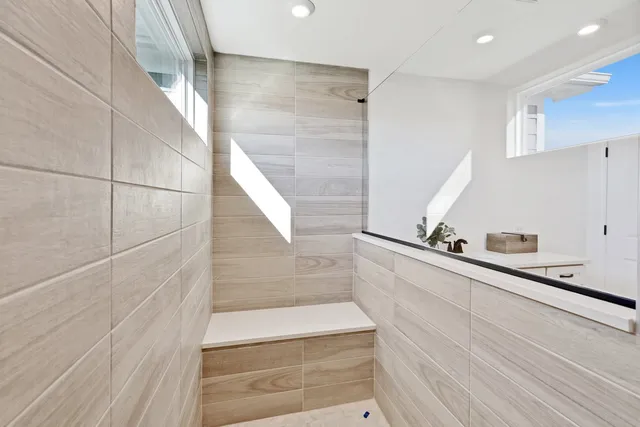 a view of staircase with white walls