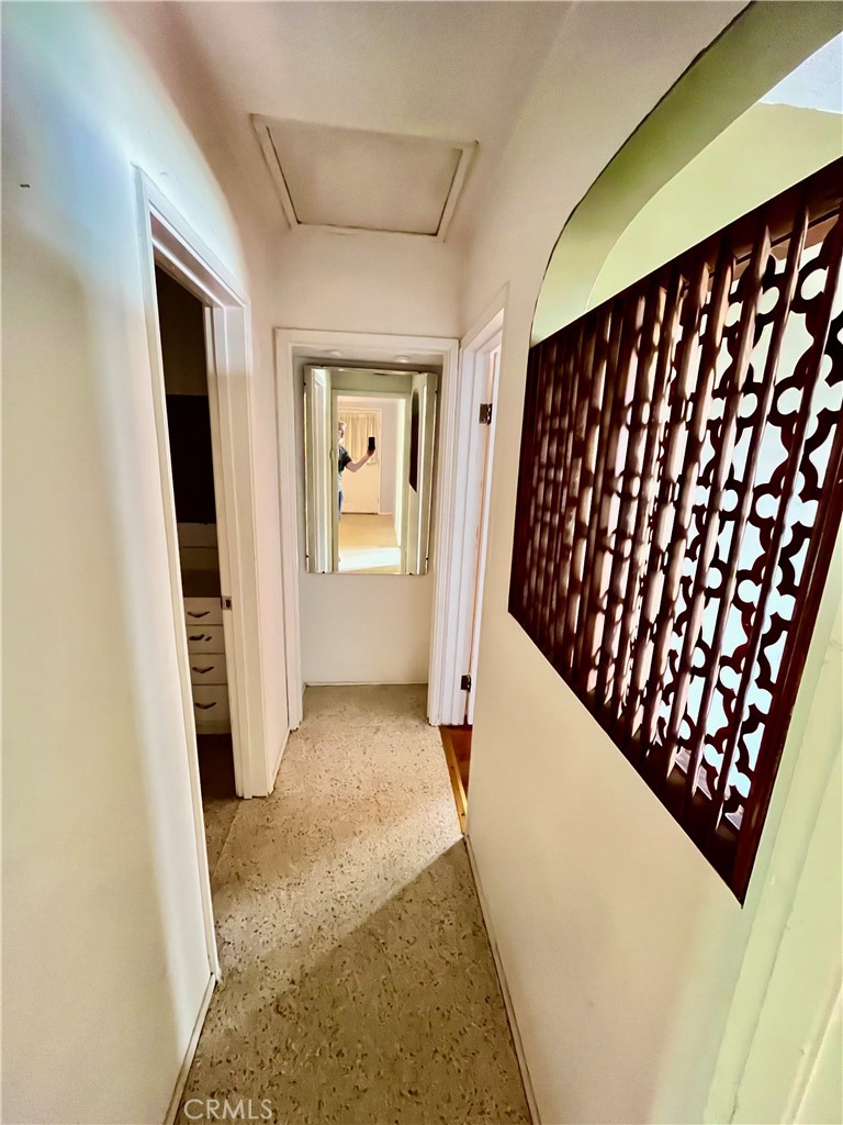 4245-4245 Homewood Court Riverside, CA 92506 - Photo 14 of 15 a view of a hallway with wooden floor and staircase