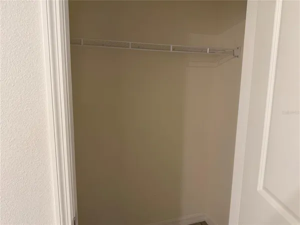 a bathroom with a toilet and shower