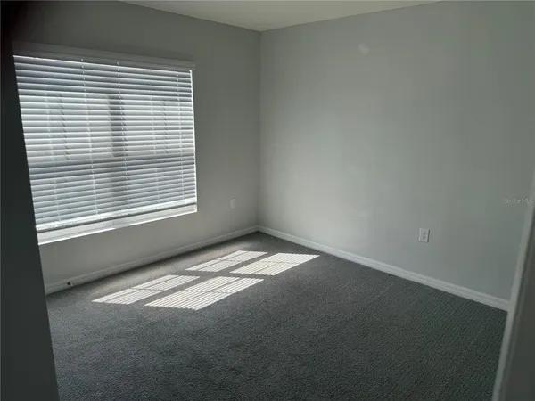 a view of a room with an empty space