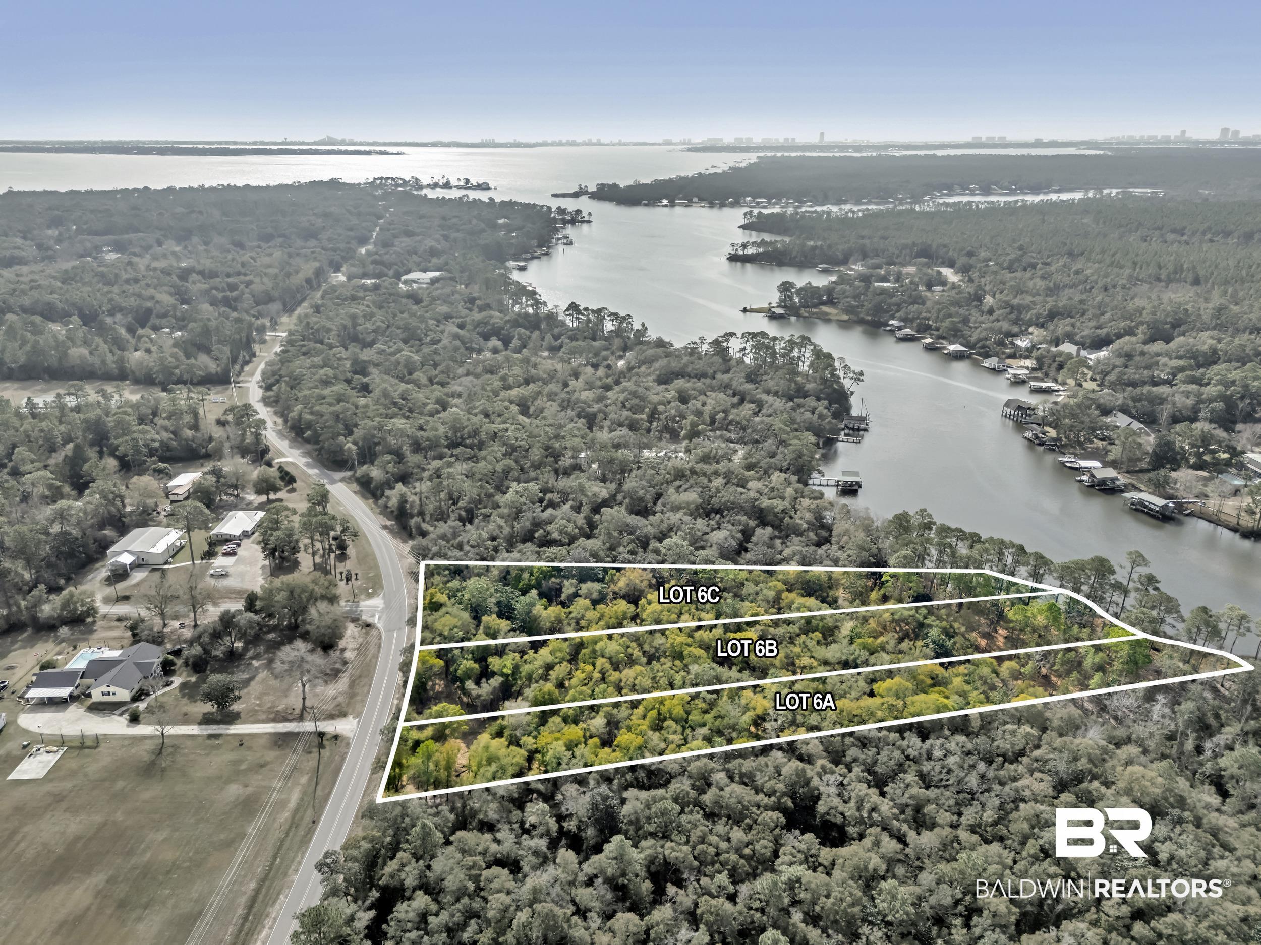 0 County Road 97 Elberta, AL 36530 - Photo 14 of 29 Aerial view of property's location with property boundaries highlighted and a large body of water