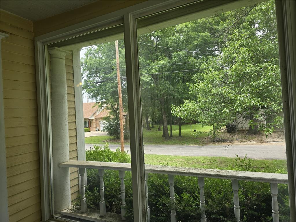 324 East Liberty Street Pilot Point, TX 76258 - Photo 19 of 22 Glass sunroom or reading room