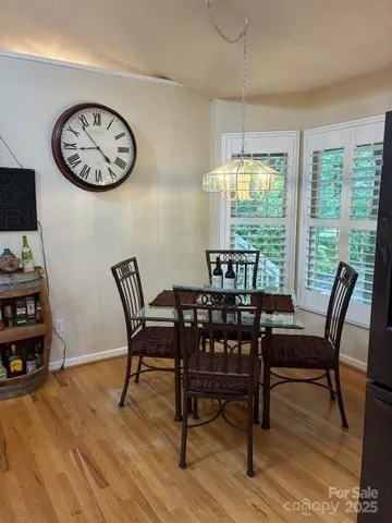 a kitchen with granite countertop a sink and a stove