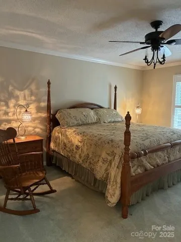 a spacious bathroom with a double vanity sink and a mirror