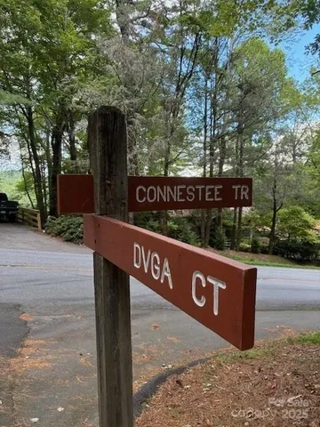 a street sign on a pole on a street