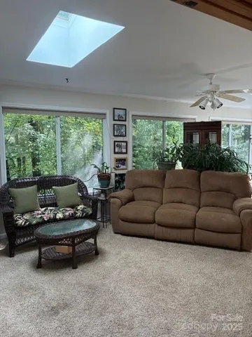 a view of a patio with a table and chairs