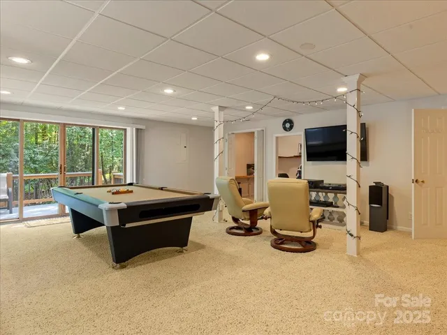 a dining room with a table and chairs