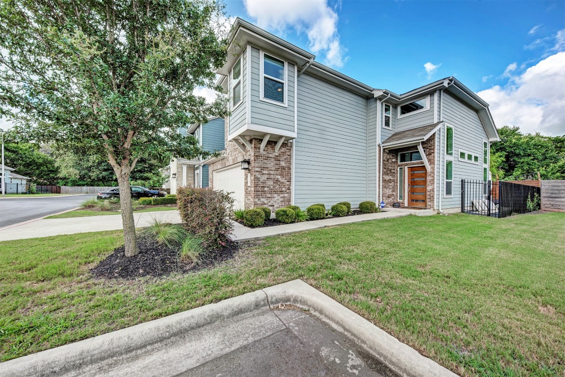 6006 Rubicon Run Austin, TX 78745 - Photo 3 of 22 a view of a house with backyard and garden