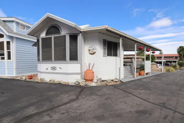 a front view of a house with an empty space