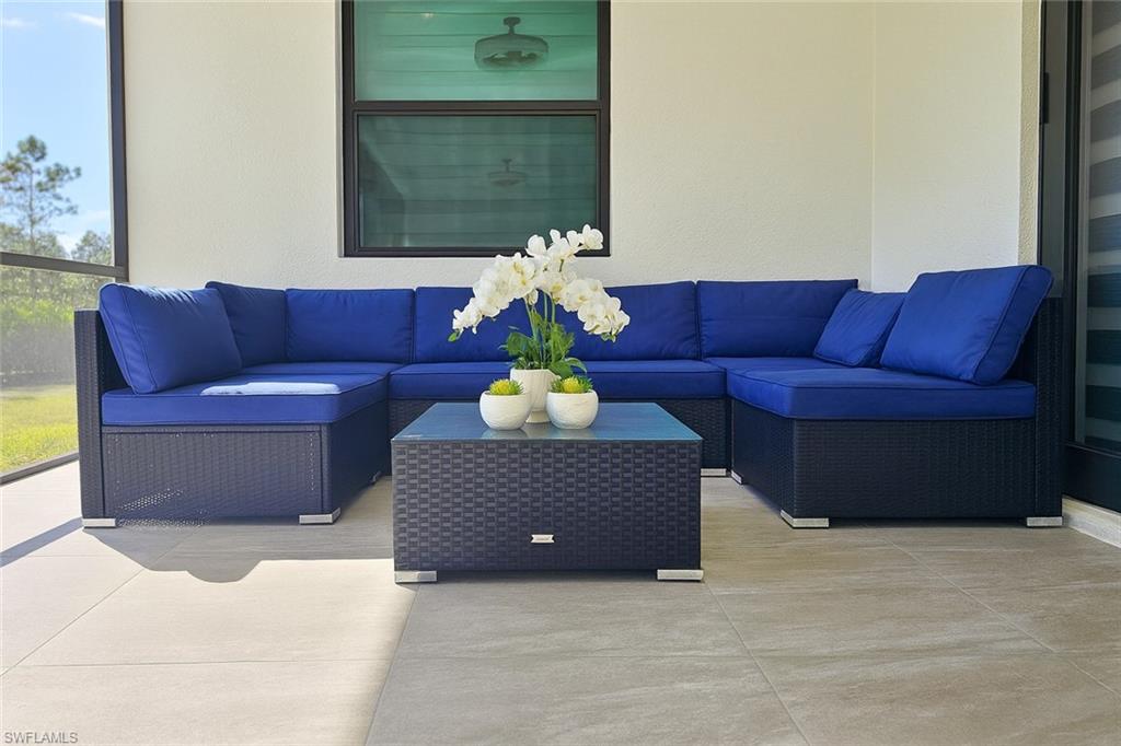 2330 4th Avenue Southeast Naples, FL 34117 - Photo 34 of 39 View of patio with an outdoor hangout area