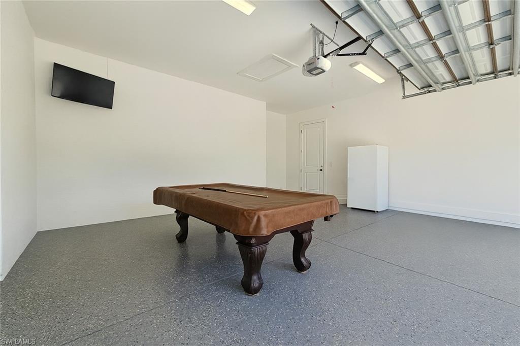 2330 4th Avenue Southeast Naples, FL 34117 - Photo 38 of 39 Recreation room featuring a garage and billiards