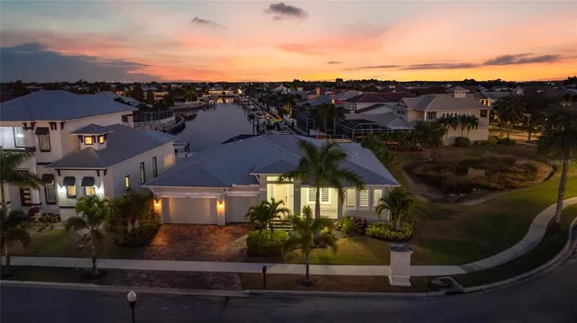 a view of multiple houses with a street