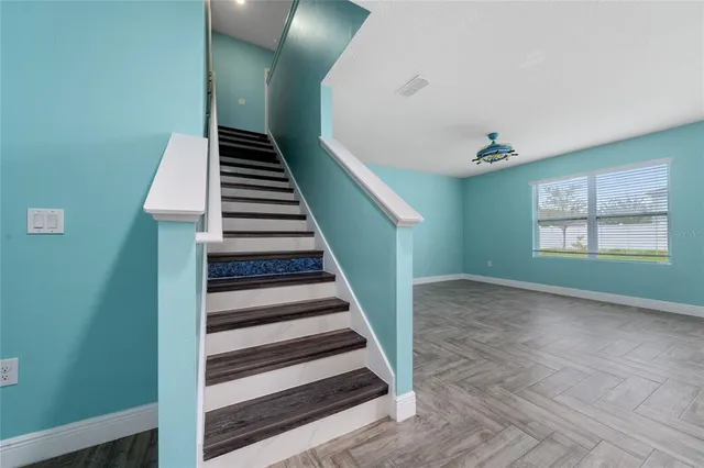 a view of an entryway with stairs