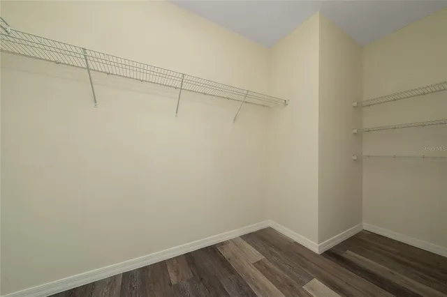 a view of a room with racks on the wall