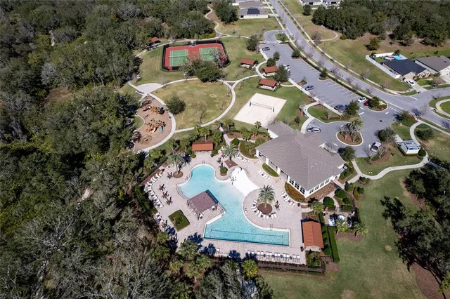 an aerial view of residential house with outdoor space