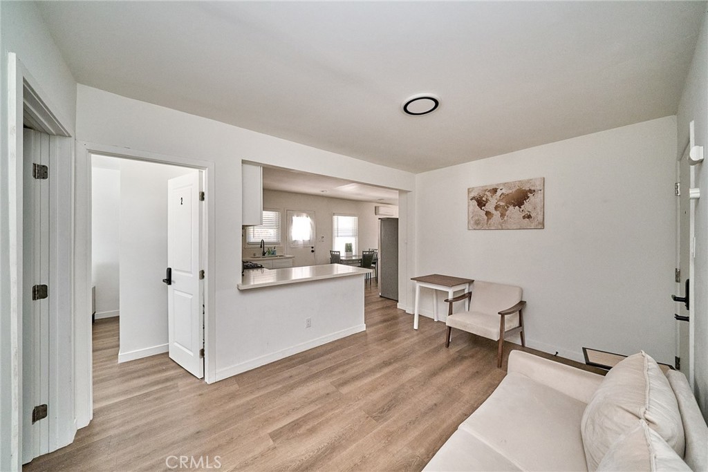 8734 Ramsgate Avenue Los Angeles, CA 90045 - Photo 5 of 19 a room with a bed and furniture