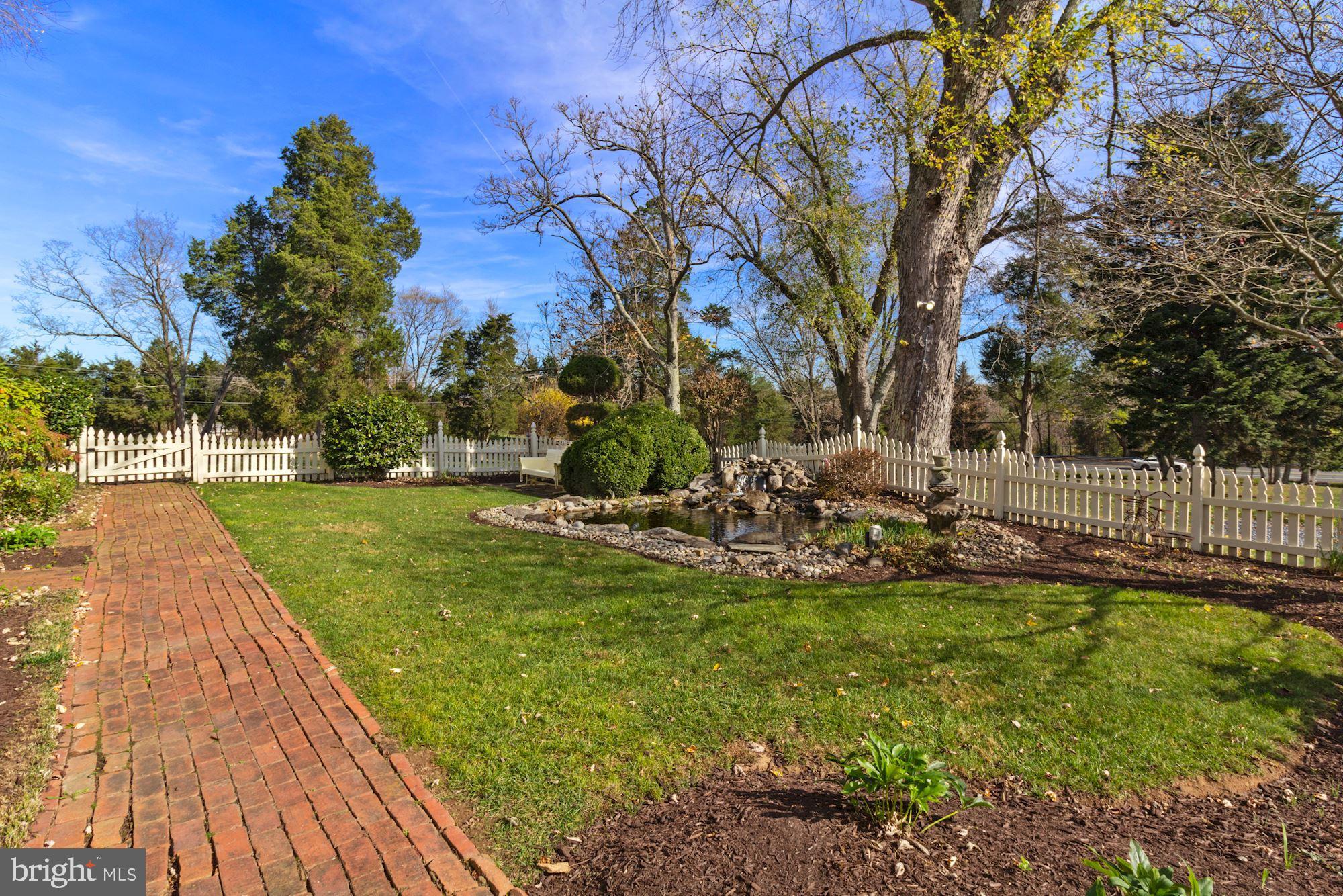 17200 Riffle Ford Road Germantown, MD 20874 - Photo 44 of 97 Exterior Front Walk and Koi Pond