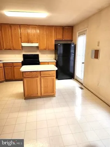 a view of balcony with wooden floor