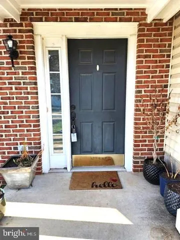 a view of a entryway door front of house