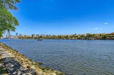 a view of an house with backyard space and garden
