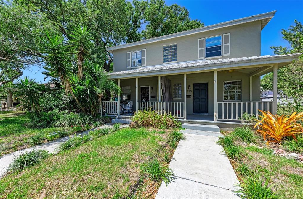 232 Channel Drive Tampa, FL 33606 - Photo 6 of 21 front view of a house with a yard