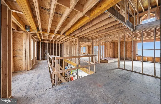 a view of a hallway with stairs