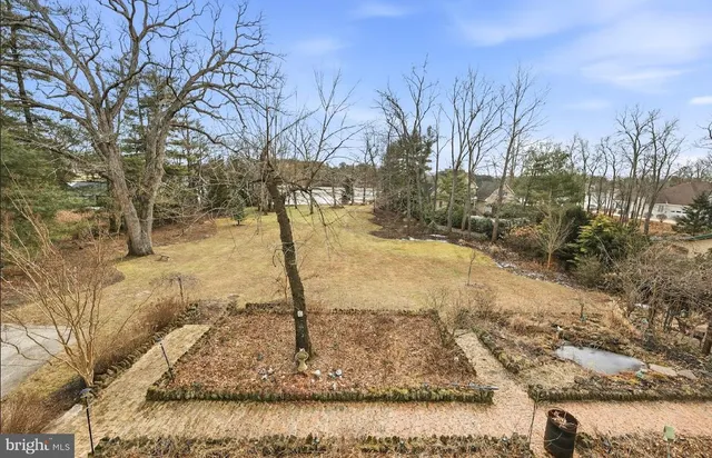 a view of a yard covered with snow
