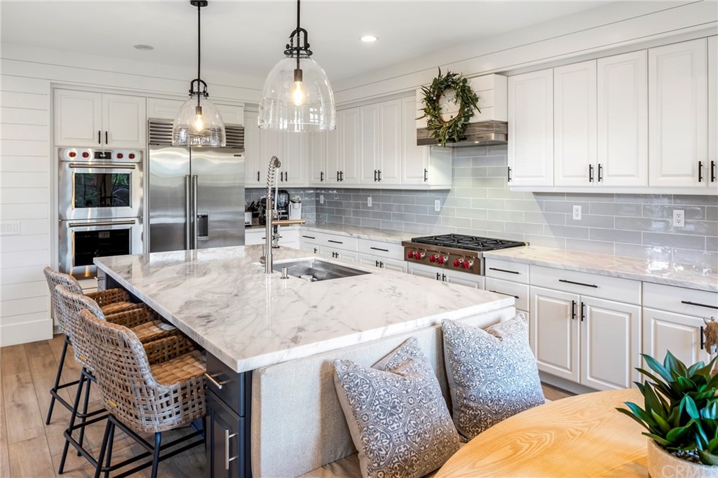 2 Emmy Lane Ladera Ranch, CA 92694 - Photo 13 of 25 a kitchen with stainless steel appliances granite countertop a sink a stove and a refrigerator