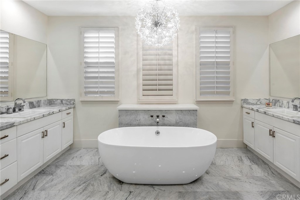 2 Emmy Lane Ladera Ranch, CA 92694 - Photo 16 of 25 a spacious bathroom with a tub sink and mirror