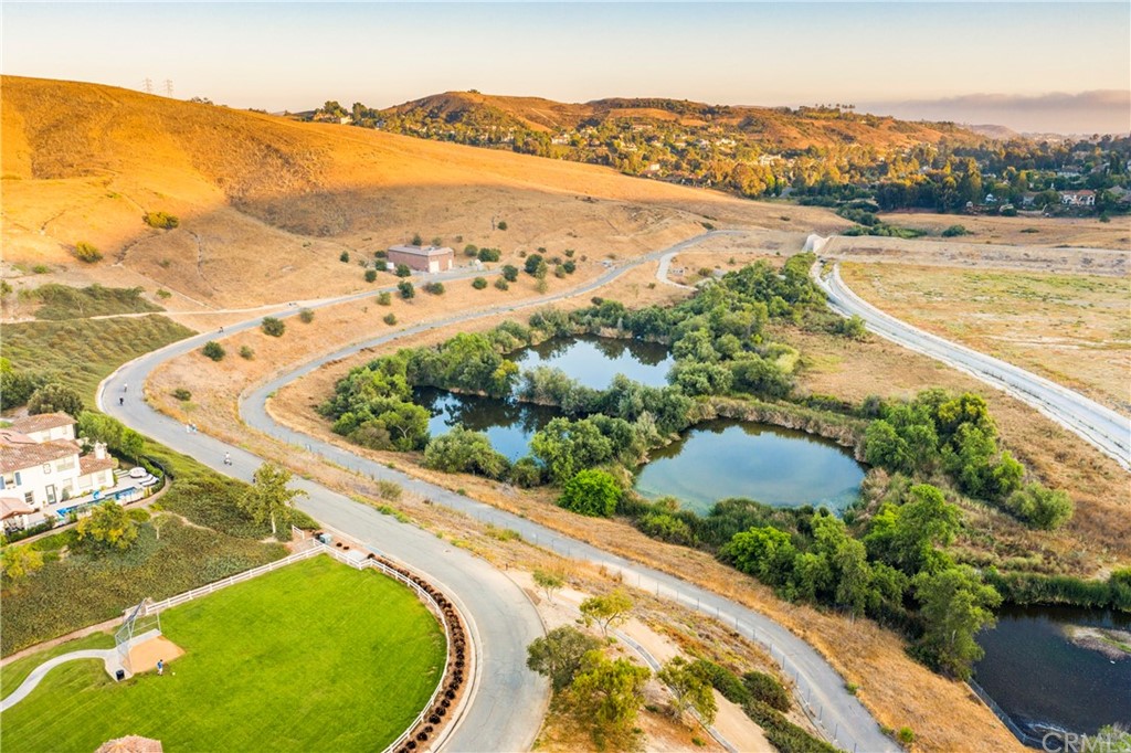 2 Emmy Lane Ladera Ranch, CA 92694 - Photo 24 of 25 an aerial view of lake and residential houses with outdoor space