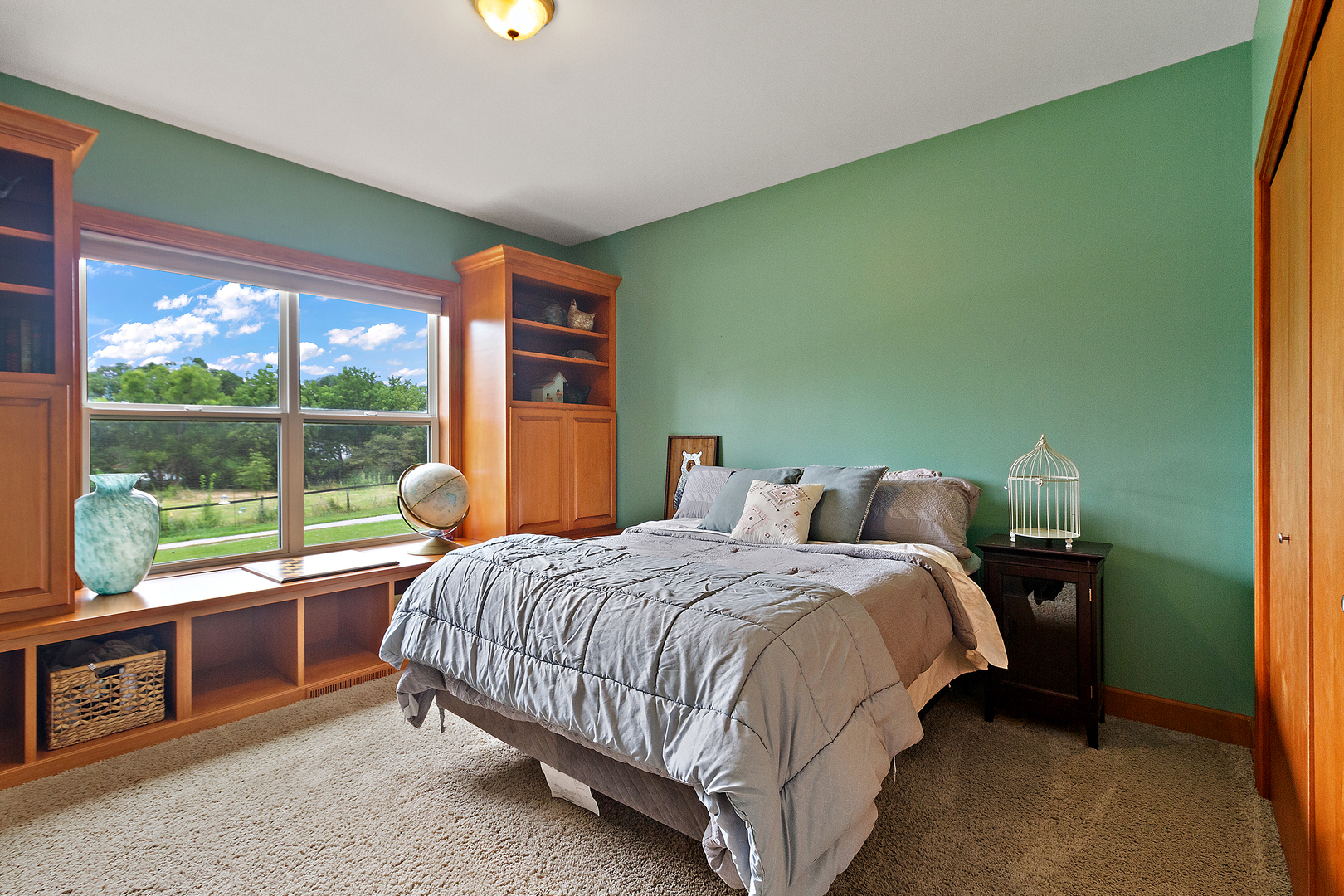 3741 East Chestnut Street Kankakee, IL 60901 - Photo 12 of 44 a bedroom with a bed and a lamp next to a window