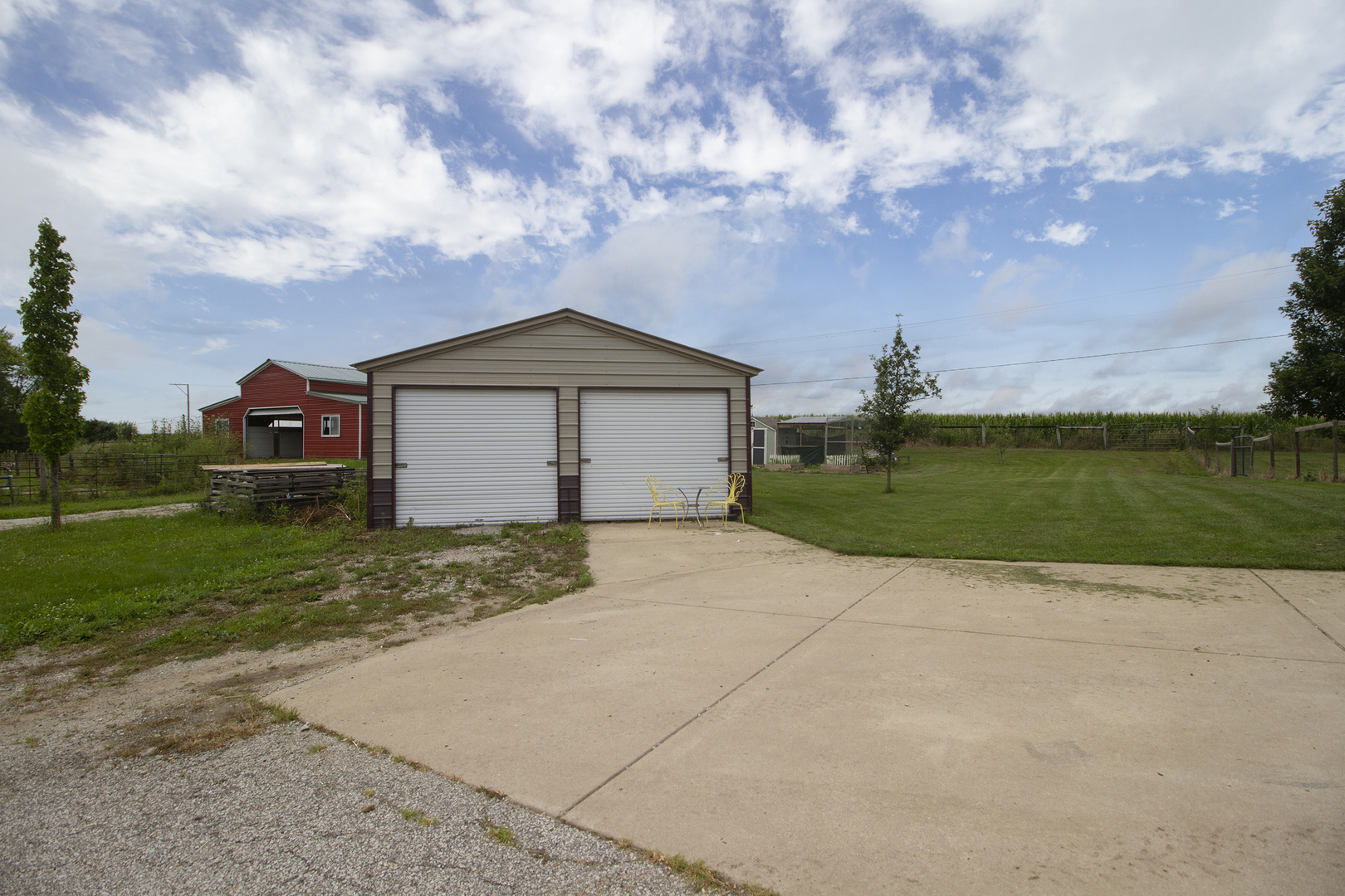 3741 East Chestnut Street Kankakee, IL 60901 - Photo 26 of 44 a front view of a house with garden