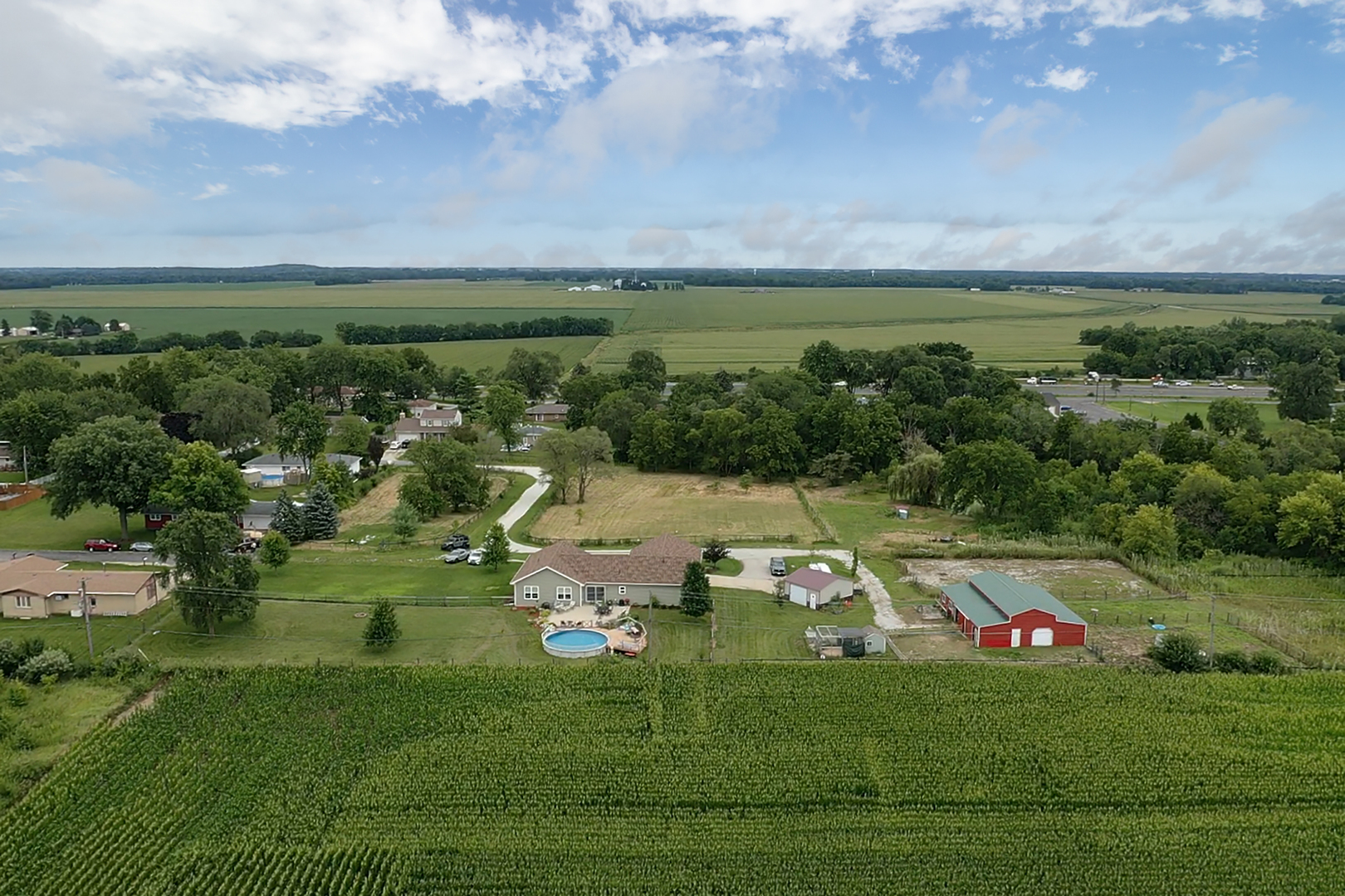 3741 East Chestnut Street Kankakee, IL 60901 - Photo 30 of 44 a front view of a house with a yard