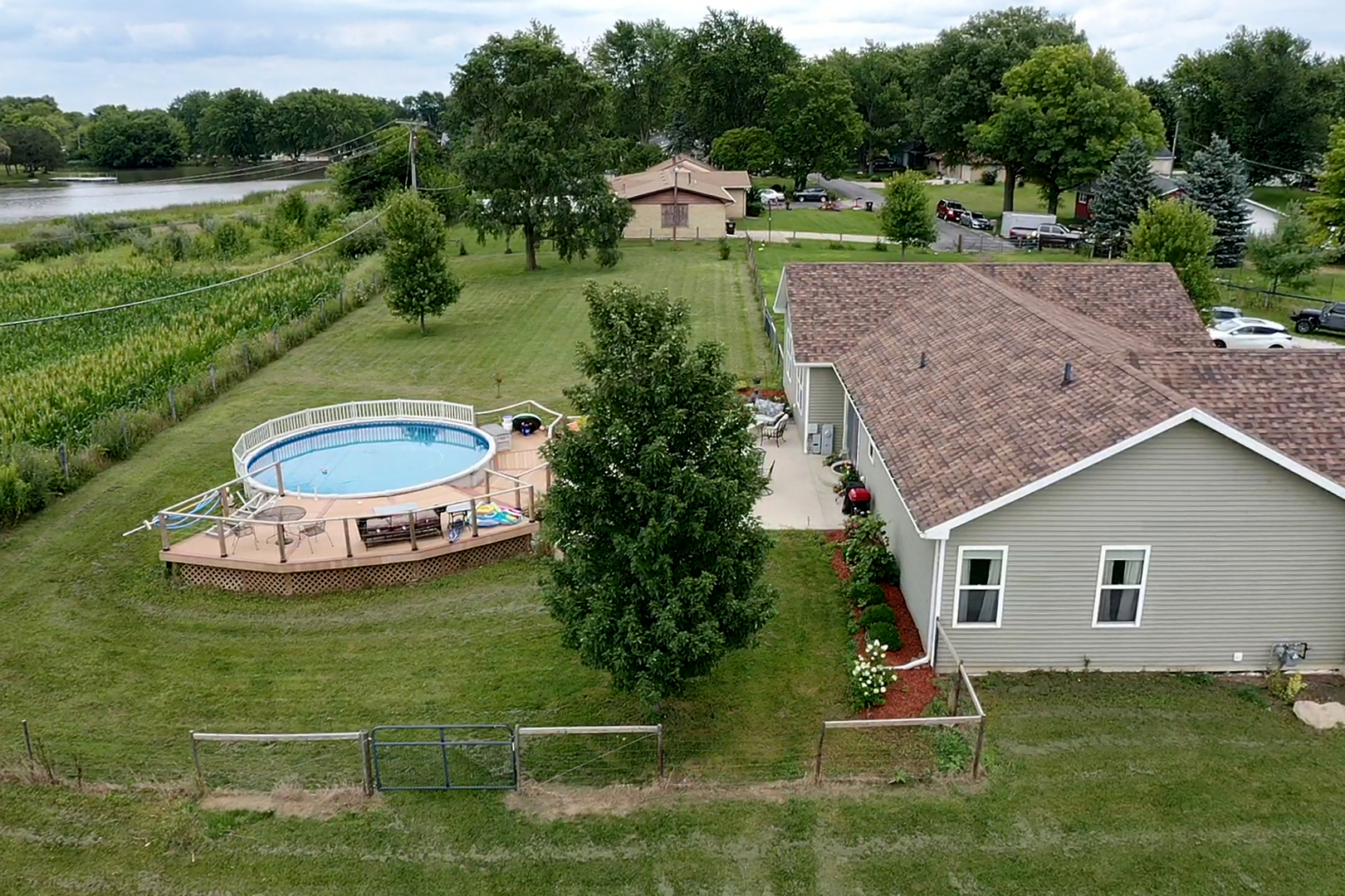 3741 East Chestnut Street Kankakee, IL 60901 - Photo 34 of 44 a view of a house with a yard and sitting area