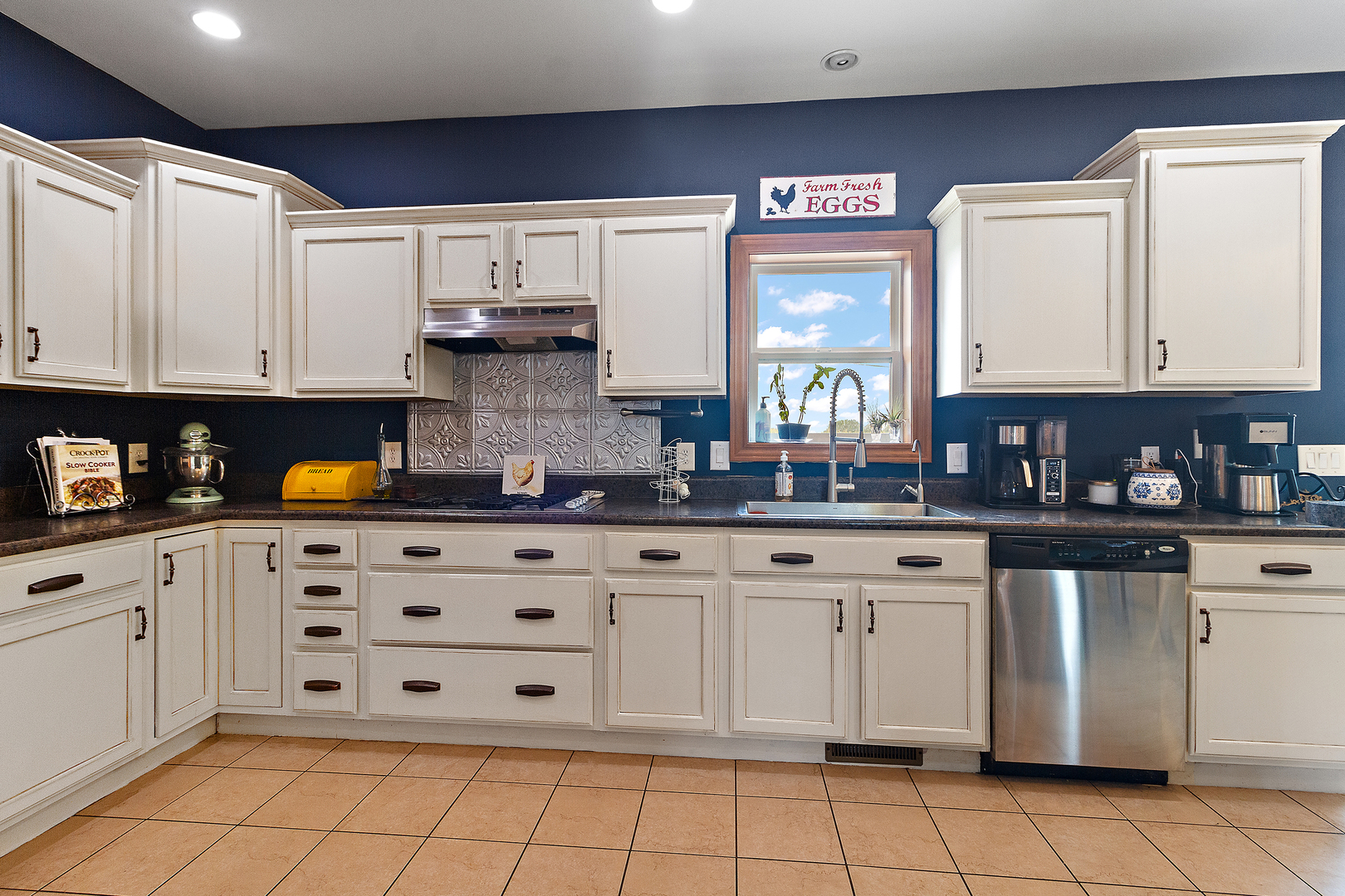 3741 East Chestnut Street Kankakee, IL 60901 - Photo 5 of 44 a kitchen with granite countertop white cabinets and stainless steel appliances