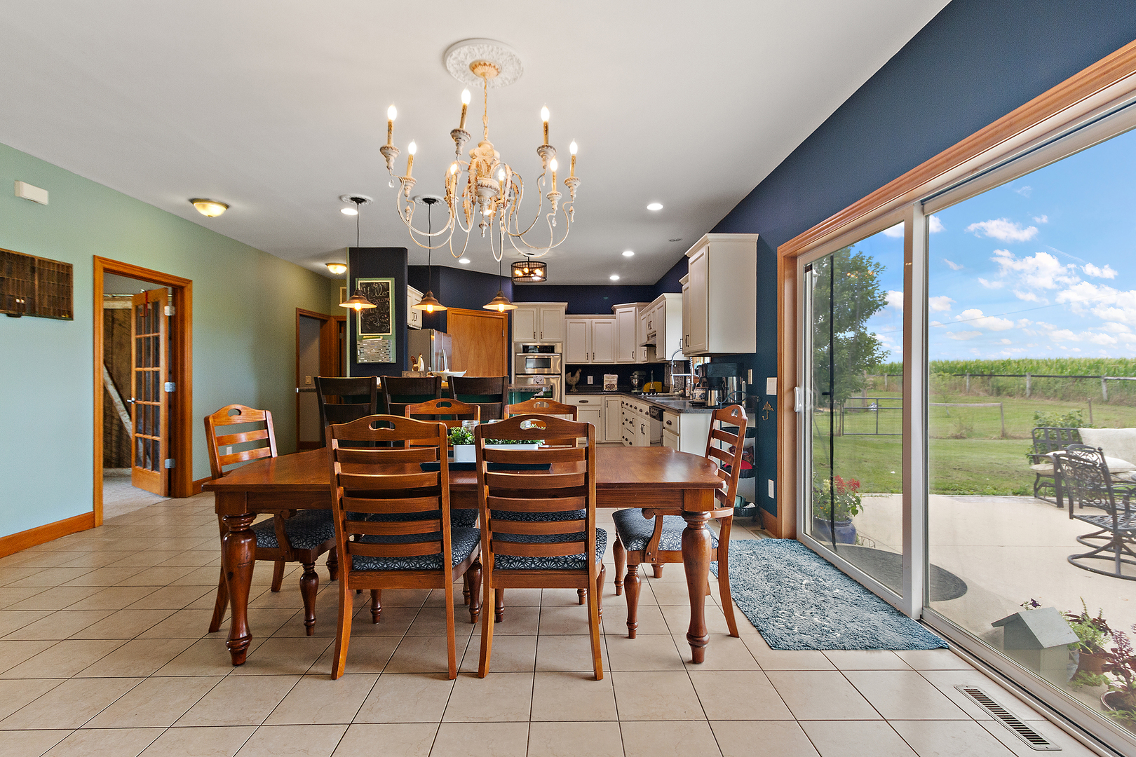 3741 East Chestnut Street Kankakee, IL 60901 - Photo 8 of 44 a view of a dining room with furniture window and outside view