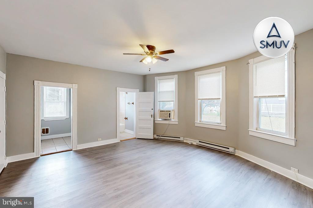 14 East Overlea Avenue, Unit 1 Baltimore, MD 21206 - Photo 1 of 15 a view of an empty room with a window