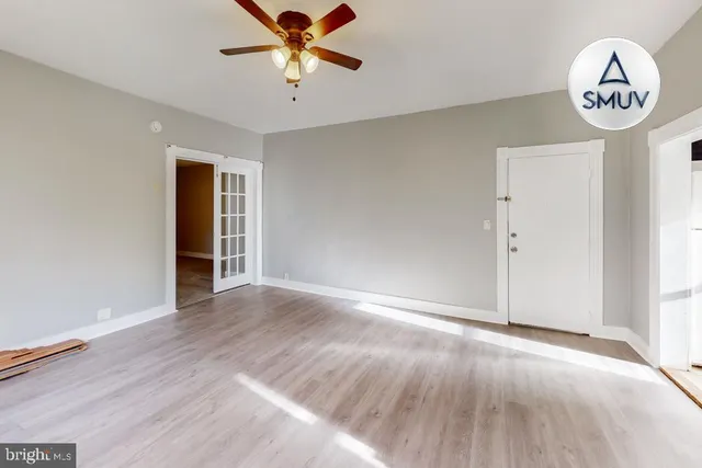 a kitchen with a sink and a refrigerator