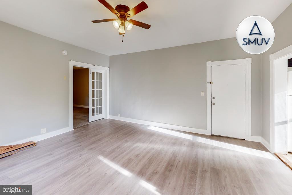 14 East Overlea Avenue, Unit 1 Baltimore, MD 21206 - Photo 12 of 15 a view of a hallway with wooden floor