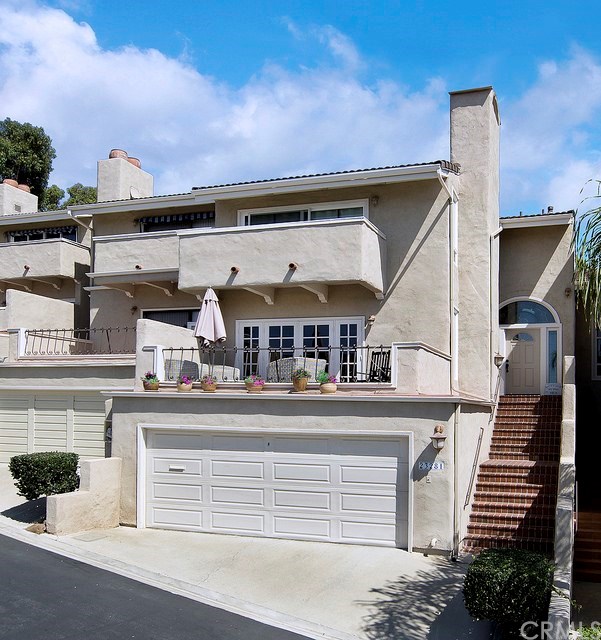 23281 Pompeii Drive, Unit 3 Dana Point, CA 92629 - Photo 15 of 19 Front Elevation- 2 Car Oversize Garage plus 2 Decks
