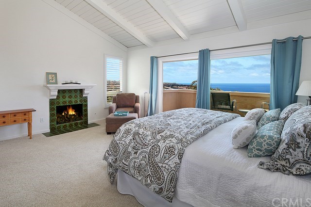 23281 Pompeii Drive, Unit 3 Dana Point, CA 92629 - Photo 7 of 19 Master Suite with Fireplace and opens to Private Deck