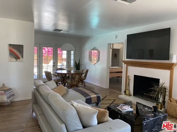 a living room with a couch and a flat screen tv