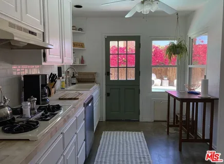 a living room with a couch and a flat screen tv