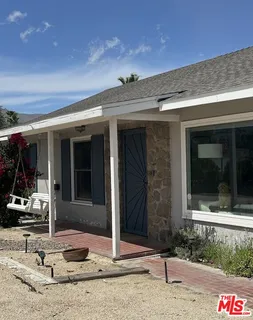 a kitchen with a stove and a microwave
