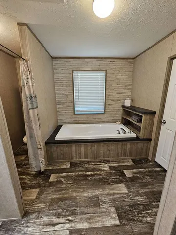 a living room with wooden floor